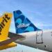 EE.UU. denuncia la compra de la aerolínea Spirit por JetBlue para frenarla