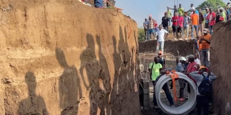 Haitianos celebraron la colocación de las primeras secciones de alcantarilla que pretenden usar para desviar las aguas del río Masacre