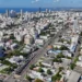 Crecer hacia arriba, inundarse abajo: la paradoja urbana del Gran Santo Domingo
